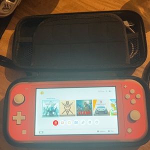 $200 obo NINTENDO SWITCH LITE CORAL PINK